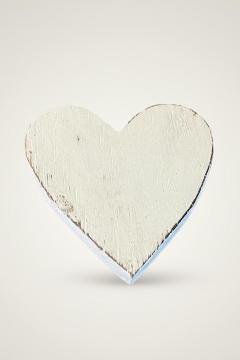 Wooden heart-shaped coaster on a white background